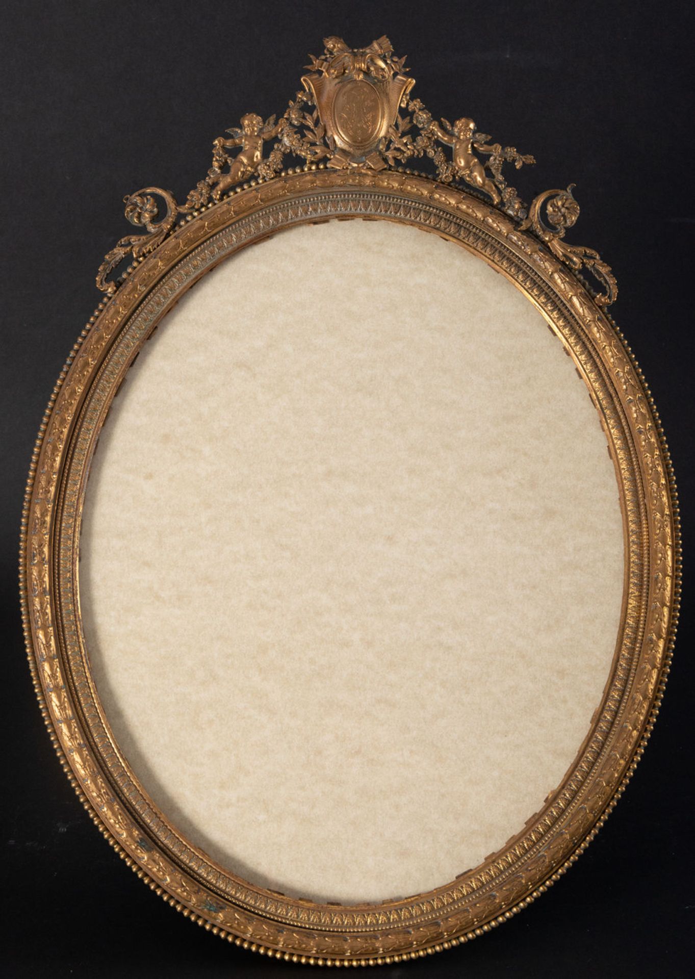 French Oval frame in Charles X style in mercury-gilt bronze, 19th century