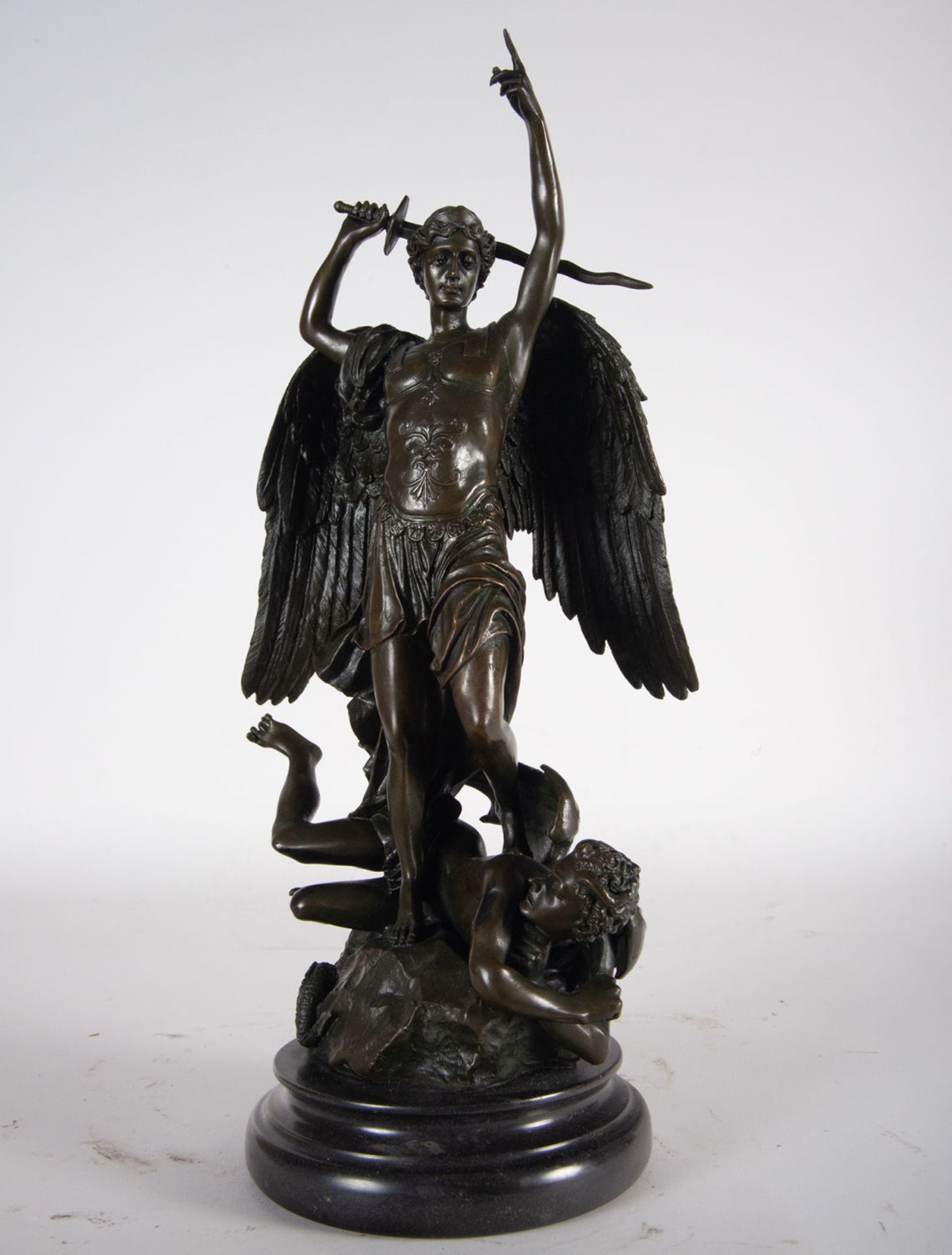 Saint Michael the Archangel Defeating the Evil One in patinated bronze, XIX - XX Centuries