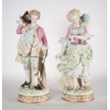 Pair of Figures of a Lady and a Gentleman in German biscuit porcelain, 19th century