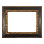 Spanish Baroque style frame in ebonized wood and carved gilt edges, 19th century