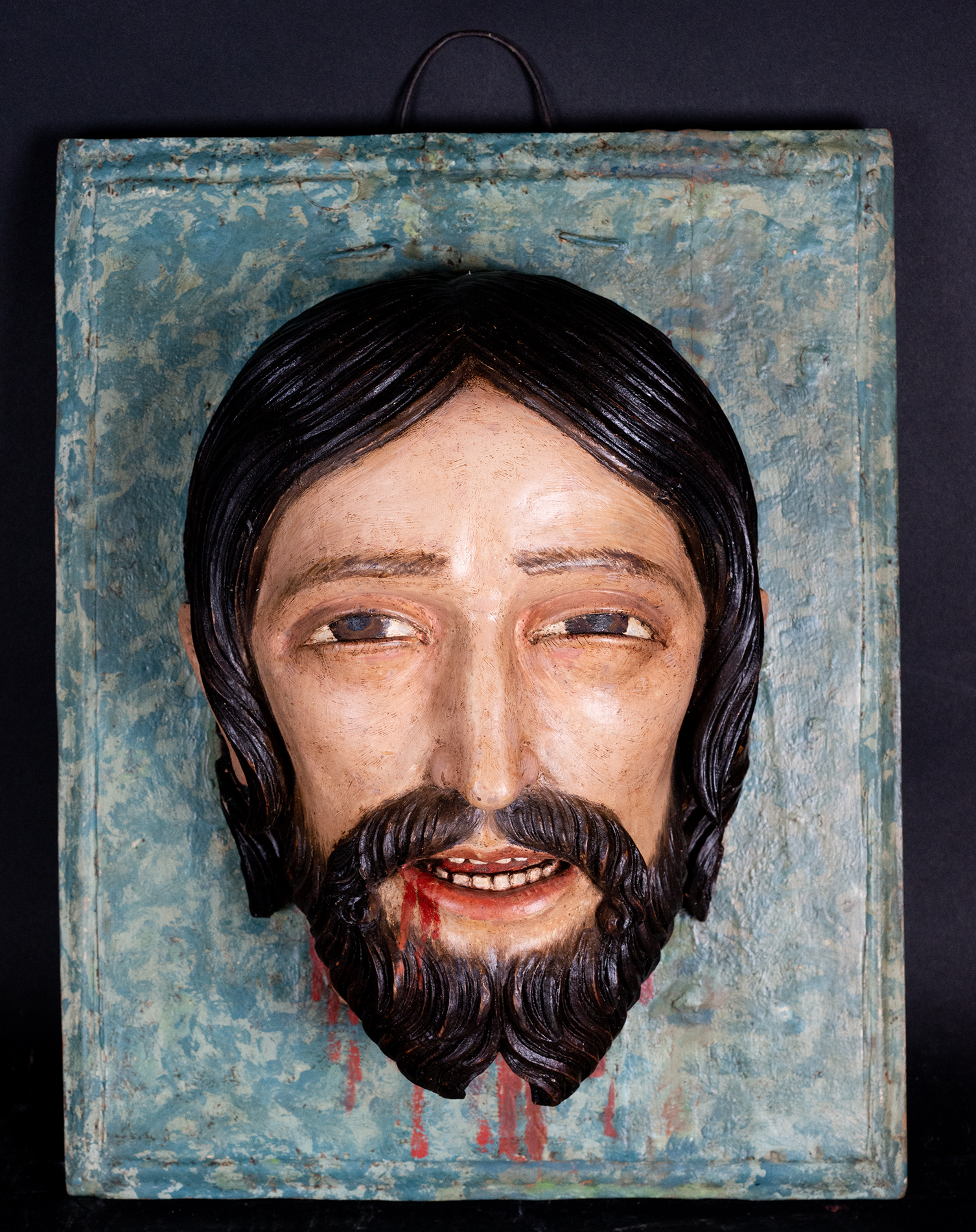 Rare wall relief of the Head of Saint John the Baptist, 18th century New Spanish colonial school