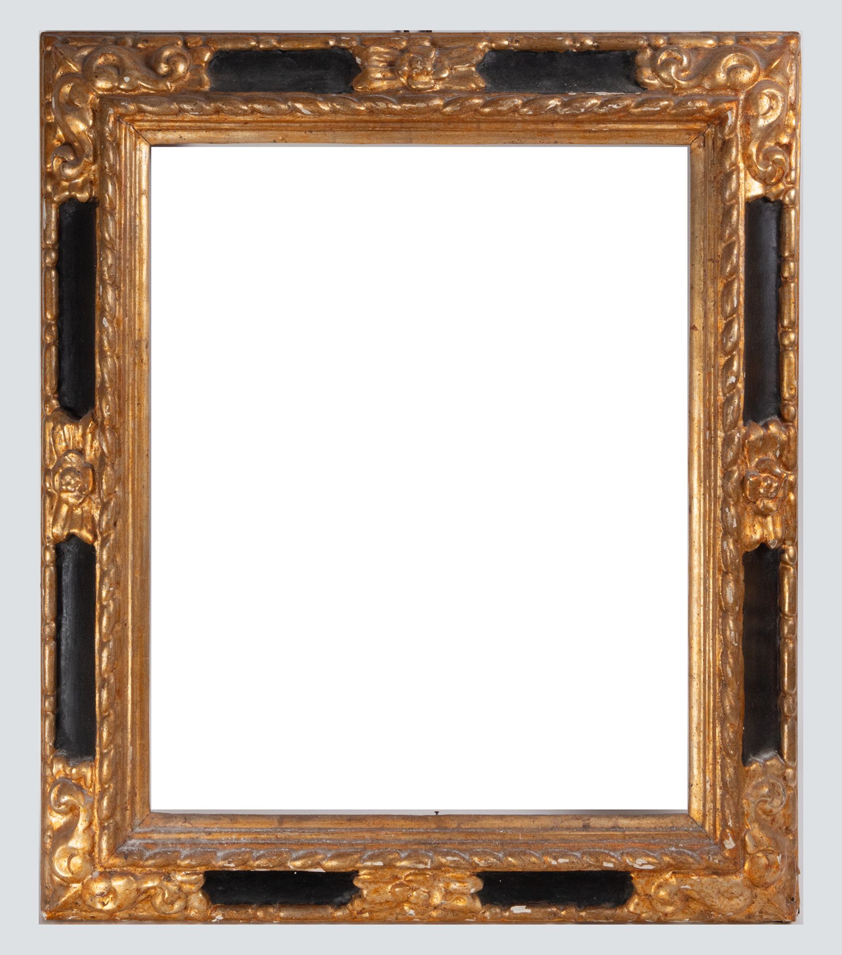 Spanish Baroque-style frame in edged, gilded, and ebonized wood