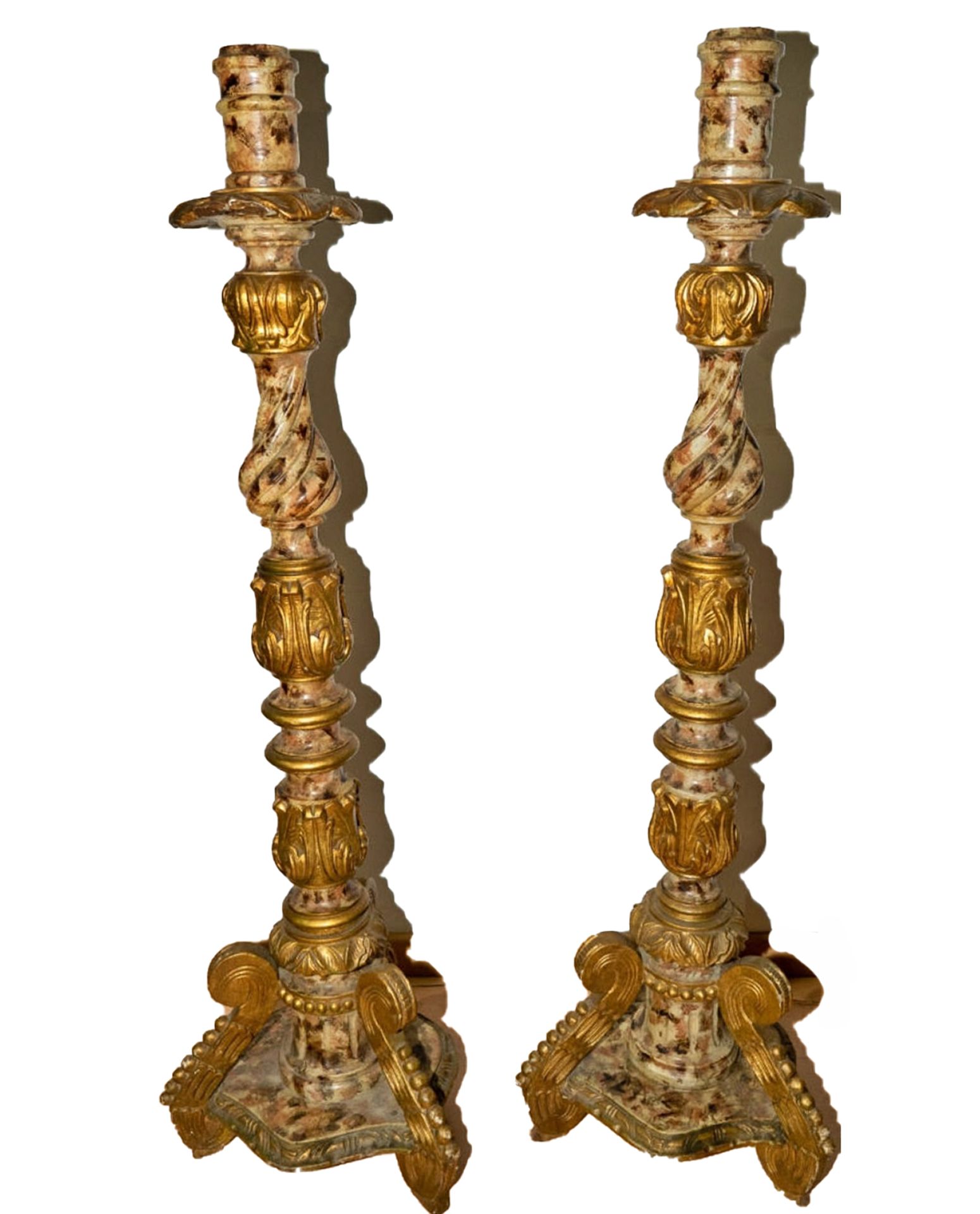 Pair of Mexican colonial Torcheres in marbled and gilded wood, 18th century