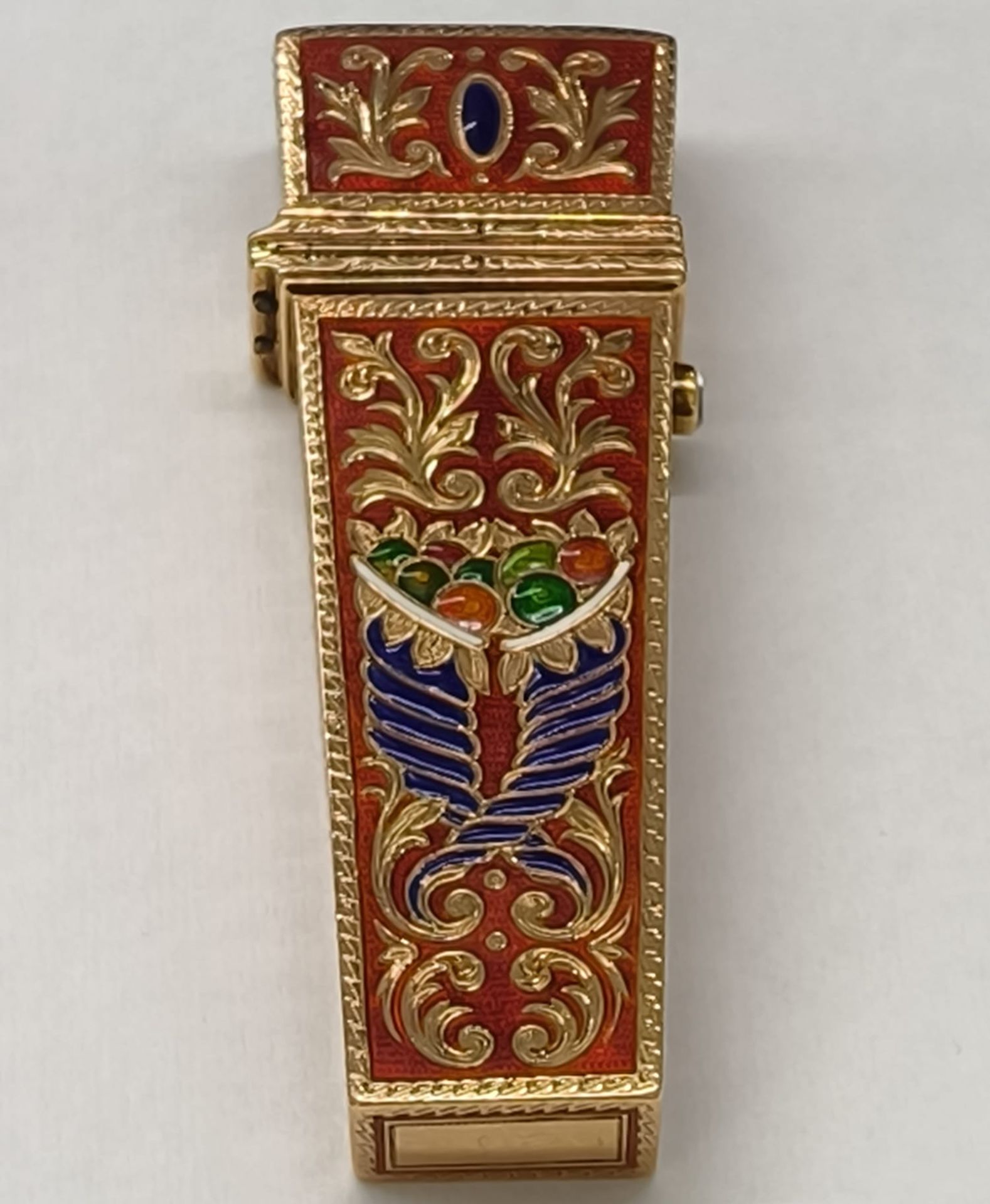 Etui in sterling gold and enamel set with rubies and old-cut diamond, Russian work from the early 20