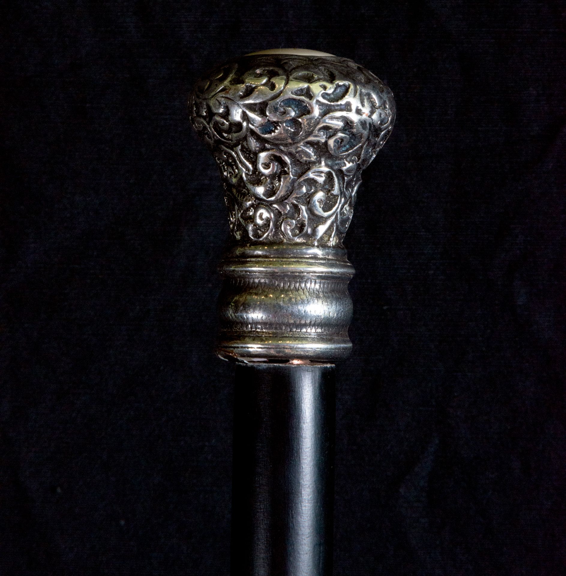 Walking stick with a silver handle in the shape of a bird carved in bone, 19th century