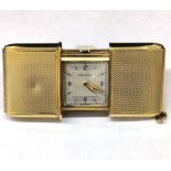 Movado tabletop 18k gold watch, 1950s-1960s