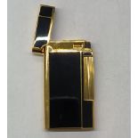 Louis Féraud lighter in gold plated black lacquer