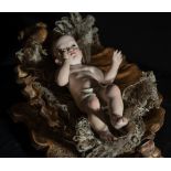 Enfant Jesus in the Cradle, polychrome wood carving with cradle in wood gilded with gold leaf, Andal
