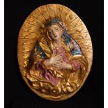 Precious Oval of Dolorosa in golden and polychrome wood, anonymous colonial Novohispano from the 18t