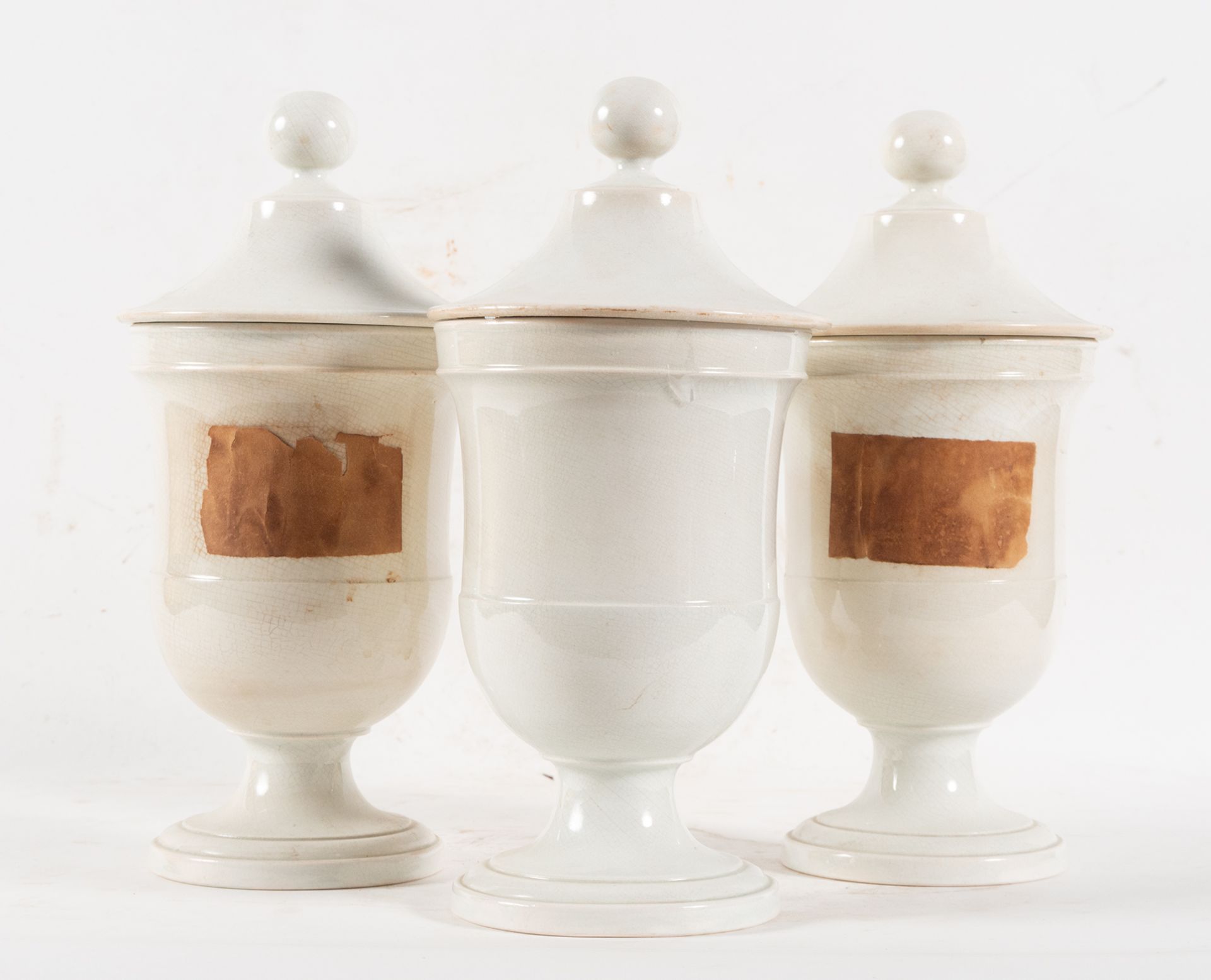 Set of three glazed ceramic pharmacy jars, 19th century