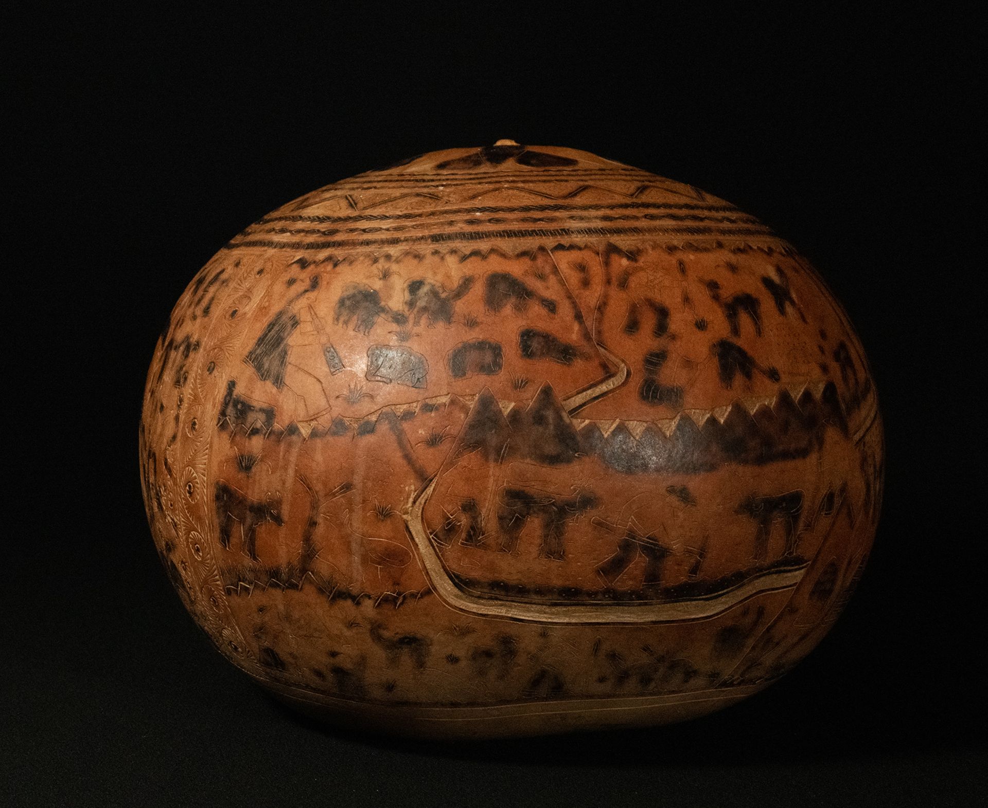 Peruvian carved gourd, 19th century