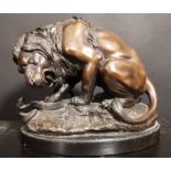 Bronze of a lion fighting a snake XIX, by Xavier Tharin, c. 1860, 19th century