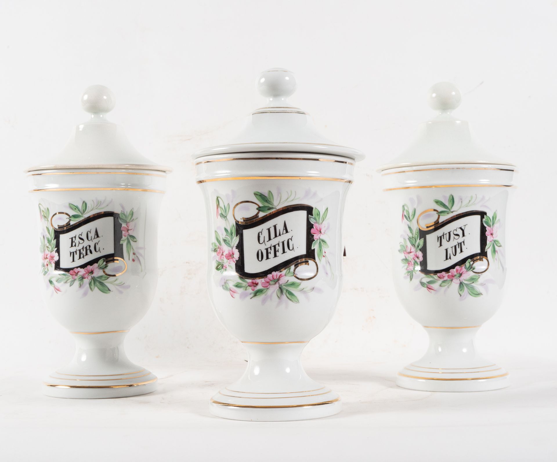 Set of three glazed ceramic pharmacy jars, 19th century