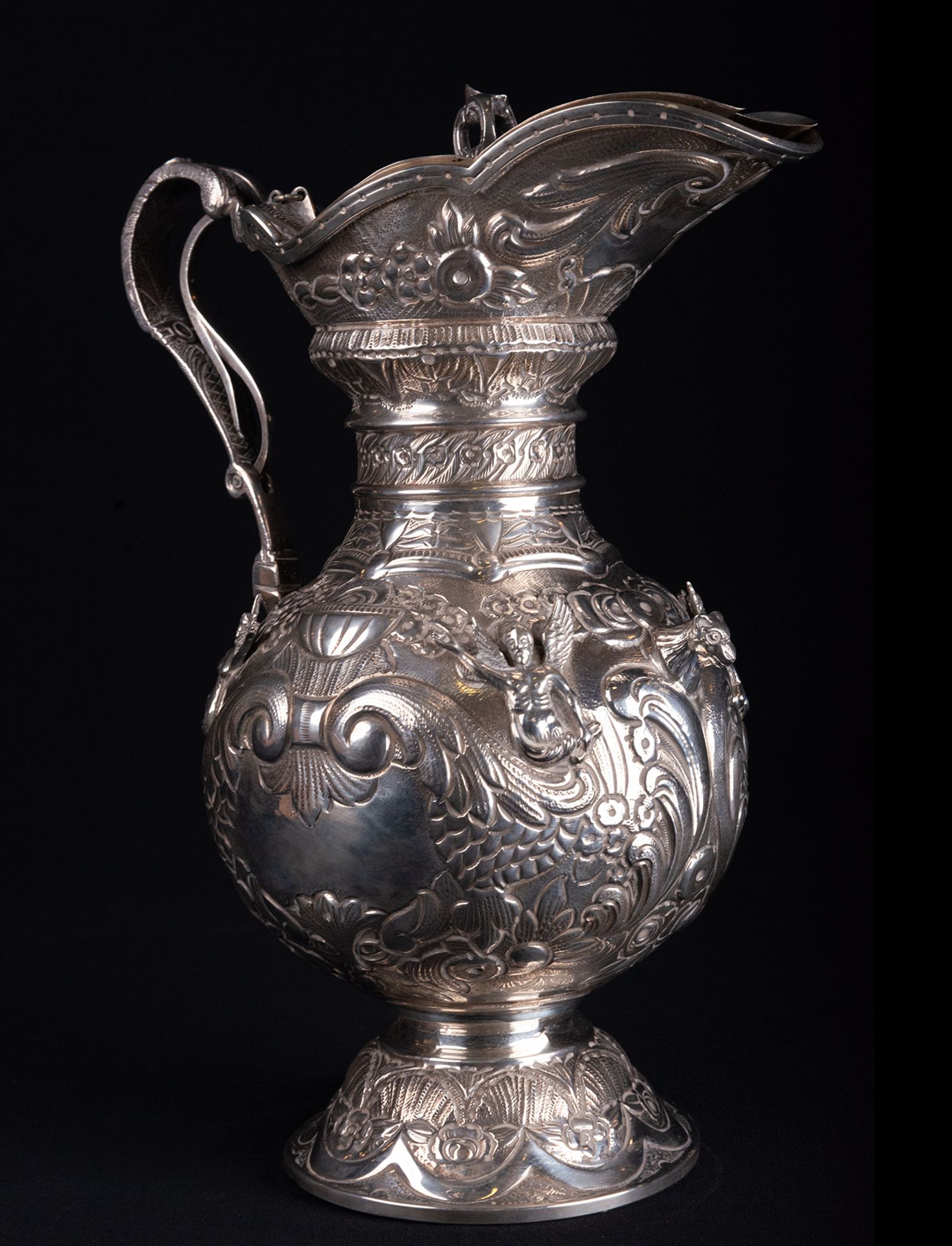 Large Solid Spanish Silver Jug with Angels and Lion motifs, 19th century, with contrasting Law