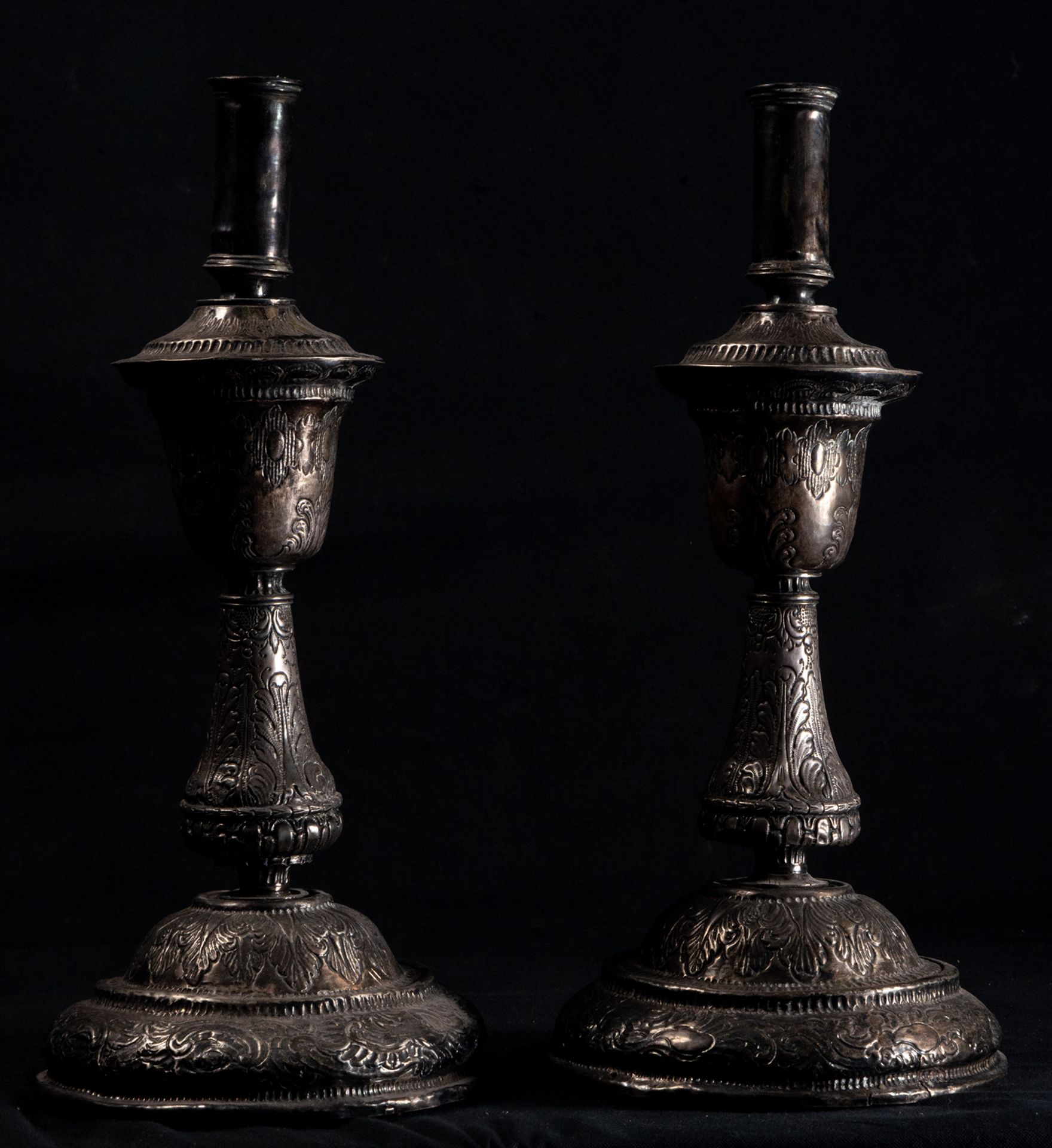 Pair of embossed silver candelabra, colonial Viceregal work from the late 17th century - early 18th 