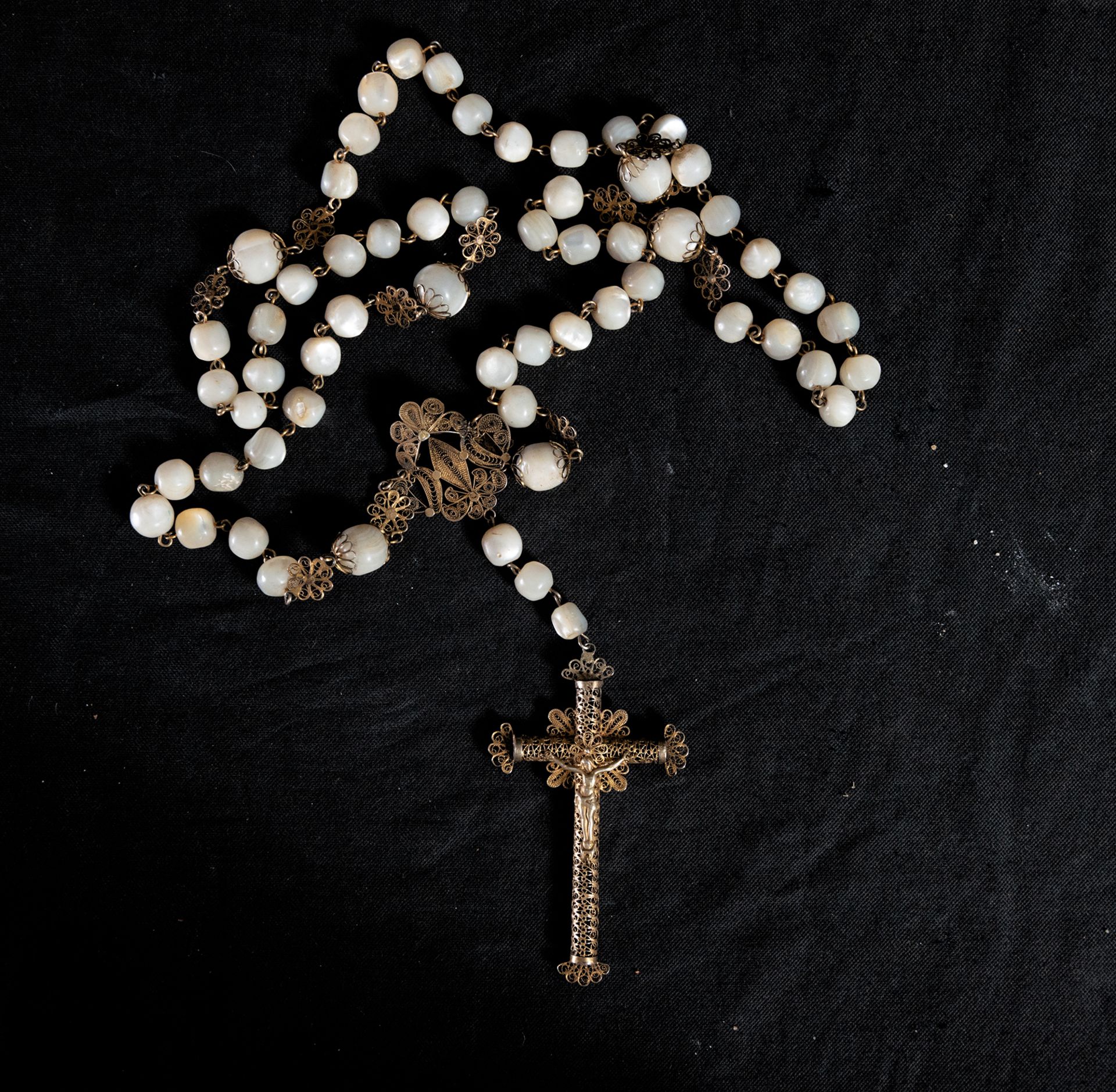Silver filigree rosary and large mother-of-pearl balls, 19th century