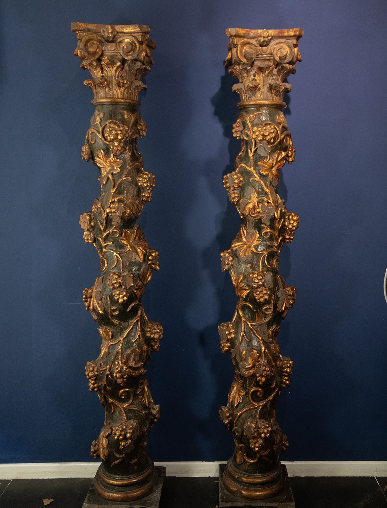 Pair of Large Solomonic Columns, 17th century, in carved, polychromed and gilt wood