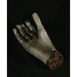 Unique in the world and highly advanced mobile and articulated aluminum prosthetic hand for a crippl