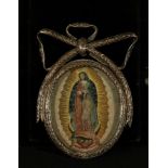 Very rare and Important large double-painted reliquary medallion on copper of the Virgin of Guadaluo