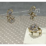 Set of earrings and ring 18k gold and zircons