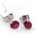 Elegant pair of ruby ​​earrings set in 18k white gold