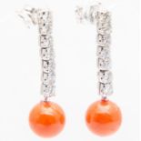 Elegant pair of teardrop earrings in red coral and diamonds of 1.50 ct in total