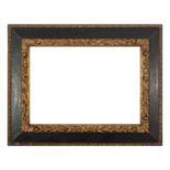 Spanish Baroque style frame in ebonized wood and carved gilt edges, 19th century