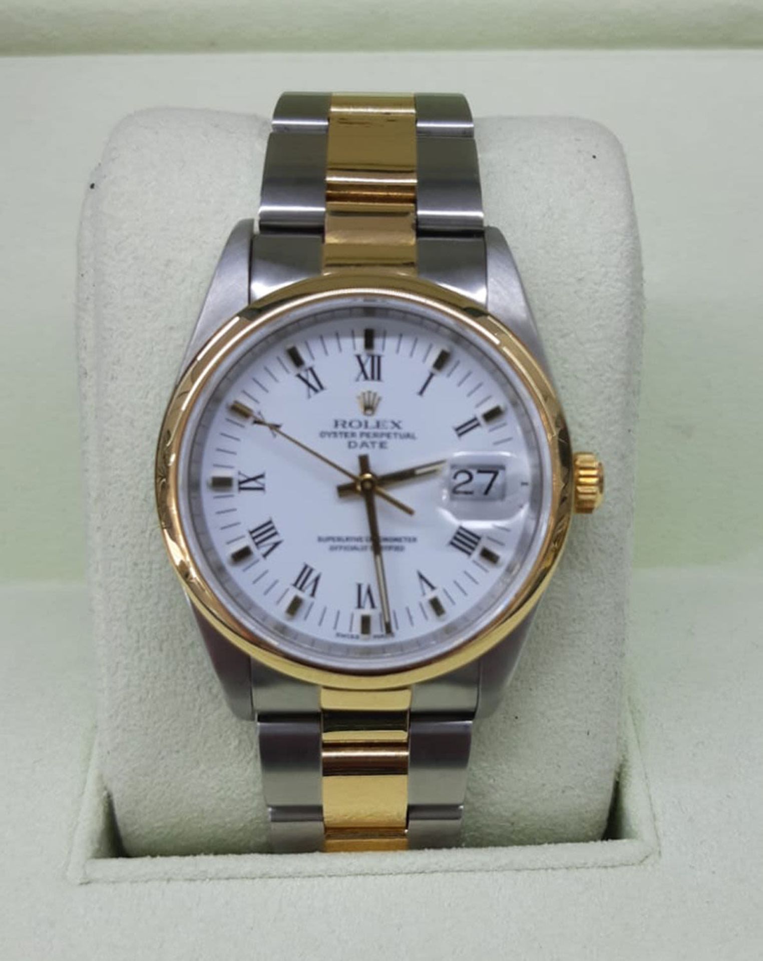 Rolex Oyster Perpetual Date, unisex cadet size, in steel and 18k gold