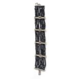 Spectacular "happy 1920s" bracelet in Art Nouveau style in faceted jet beads, Platinum and Diamonds,