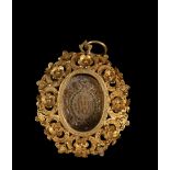 Important Reliquary Medallion in 20k or 22k gold filigree with relics of Saint Ignatius of Loyola, f