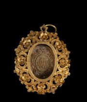 Important Reliquary Medallion in 20k or 22k gold filigree with relics of Saint Ignatius of Loyola, f
