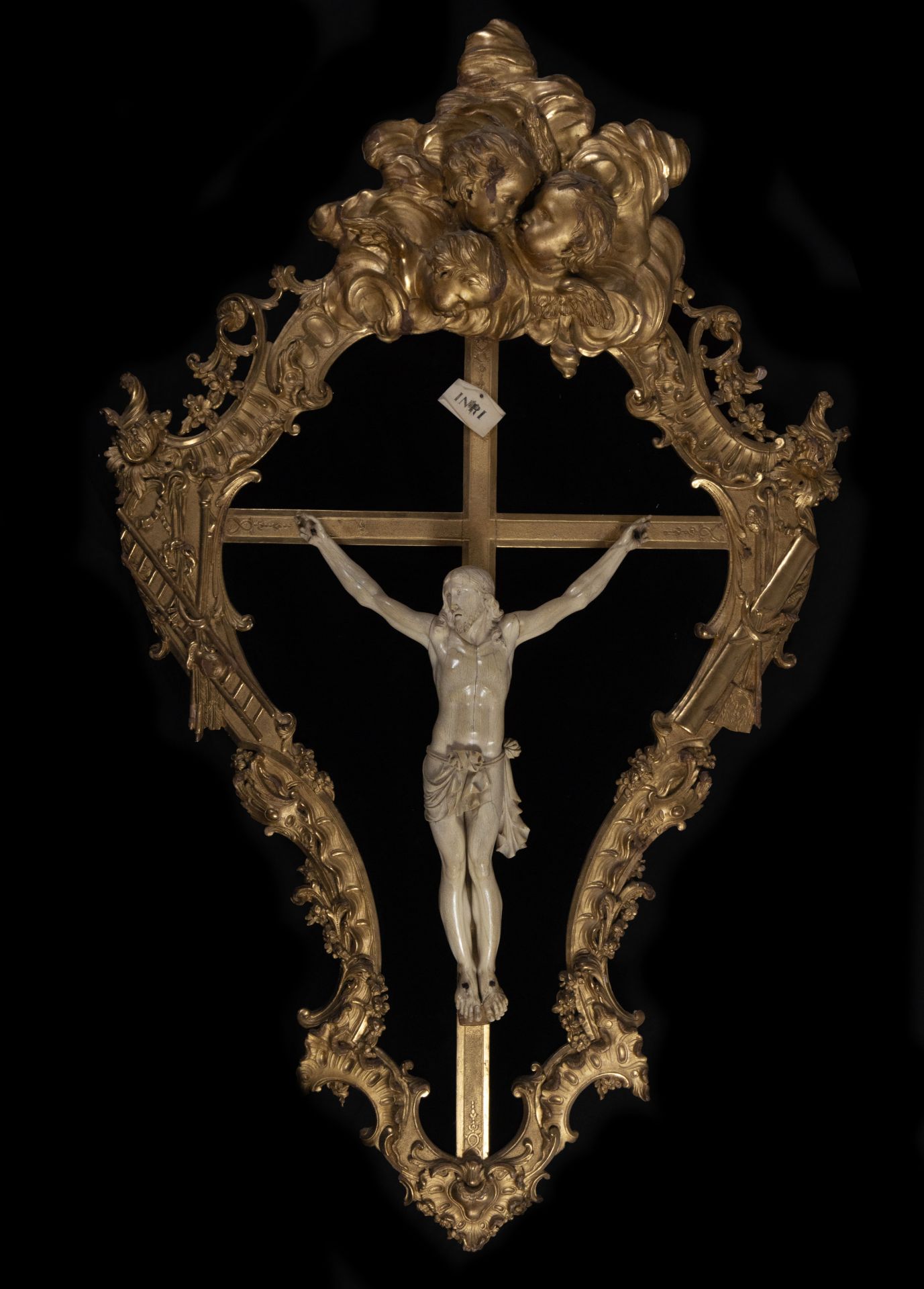 Large French Christ of Dieppe in Ivory, Louis XV period, with important frame carved in gilded wood 