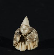 Japanese Netsuke on Mammoth Tusk (Mammuthus primigenius) representing Japanese Theater Actor, 19th c