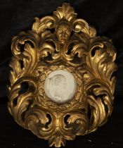 Rococo frame with oval portrait in biscuit porcelain, France, 18th century