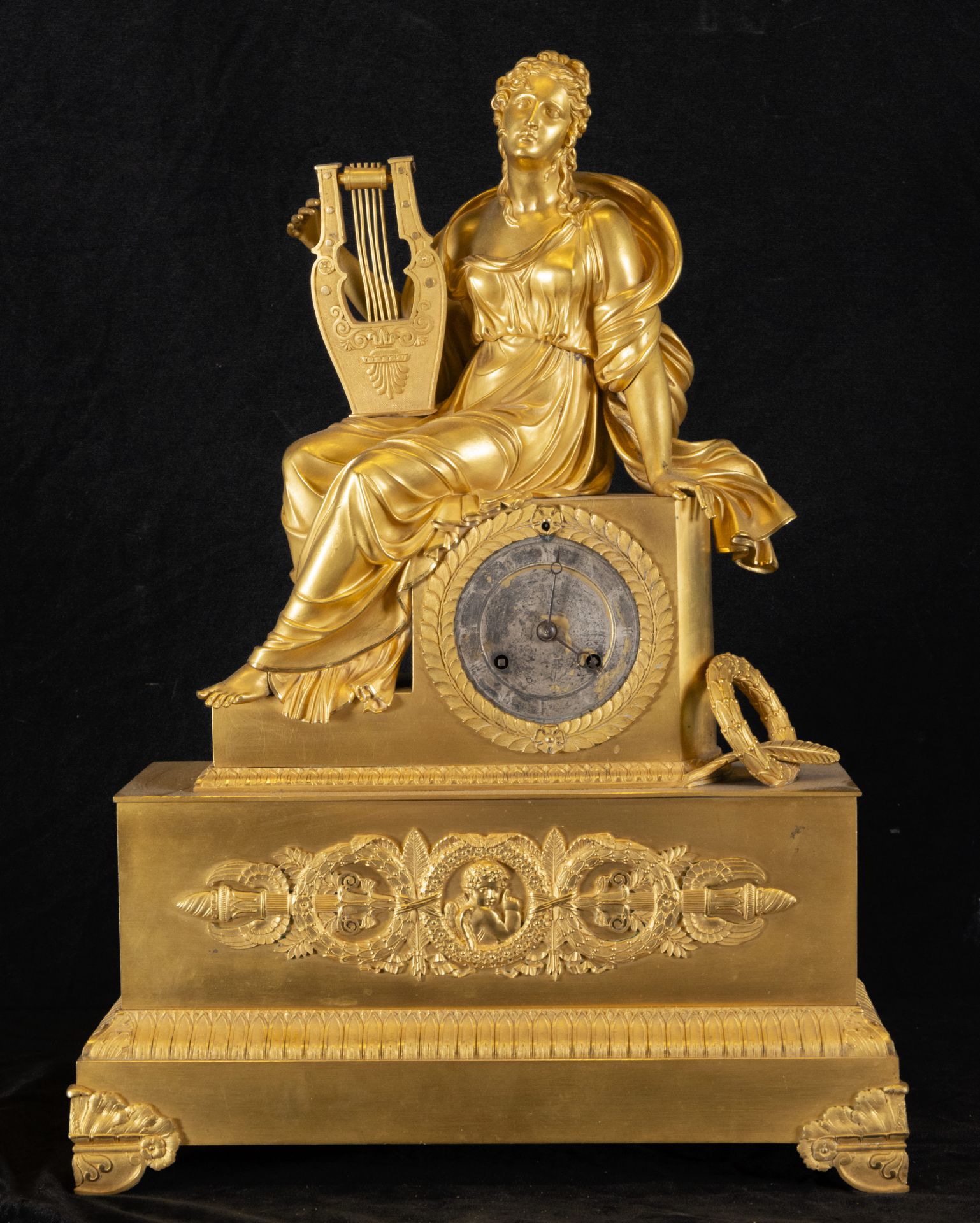 Important French Empire period table clock, early 19th century, in mercury gilt bronze
