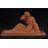 Academicist style reclining lady with dog, French school from the first half of the 20th century, si