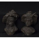 Pair of calamine busts of children, 19th century French school