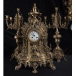 Large Neo-Gothic Bronze Table Clock, 19th - 20th century, with a pair of candelabras