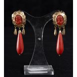 Elegant Italian earrings with caryatids and Mediterranean red coral tears mounted in gold, 19th cent