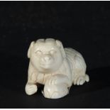 Japanese Netsuke on Mammoth Tusk (Mammuthus primigenius) representing Foo Dog, 19th century Japanese