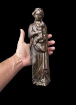 Large Virgin and Child from Mechelen in bronze from the mid-15th century, possibly forming part of a