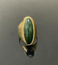 18 kt Yellow Gold and Jade Oval Ring.