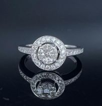 White Gold Ring with border and invisible central setting in Diamonds