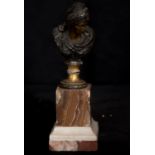 Exquisite bust in patinated and gilded bronze representing slave with onyx base, Italian Baroque sch