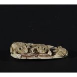 Japanese Netsuke on Mammoth Tusk (Mammuthus primigenius) representing three frogs, 19th century Japa