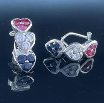 Three hearts earrings in white gold and diamonds with omega closure