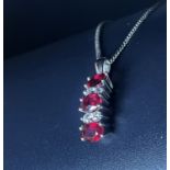 pendant with cuban chain of ob rubies t oval 1.35 ct and diamonds tb 0.12 weight 4.6 g