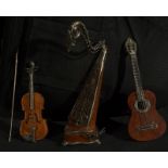 Set of three miniatures of musical instruments, 19th to 20th centuries