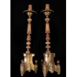 Pair of large Italian baroque torcheres in gilded wood, 18th century