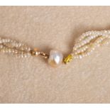 18kt gold choker with natural pearls